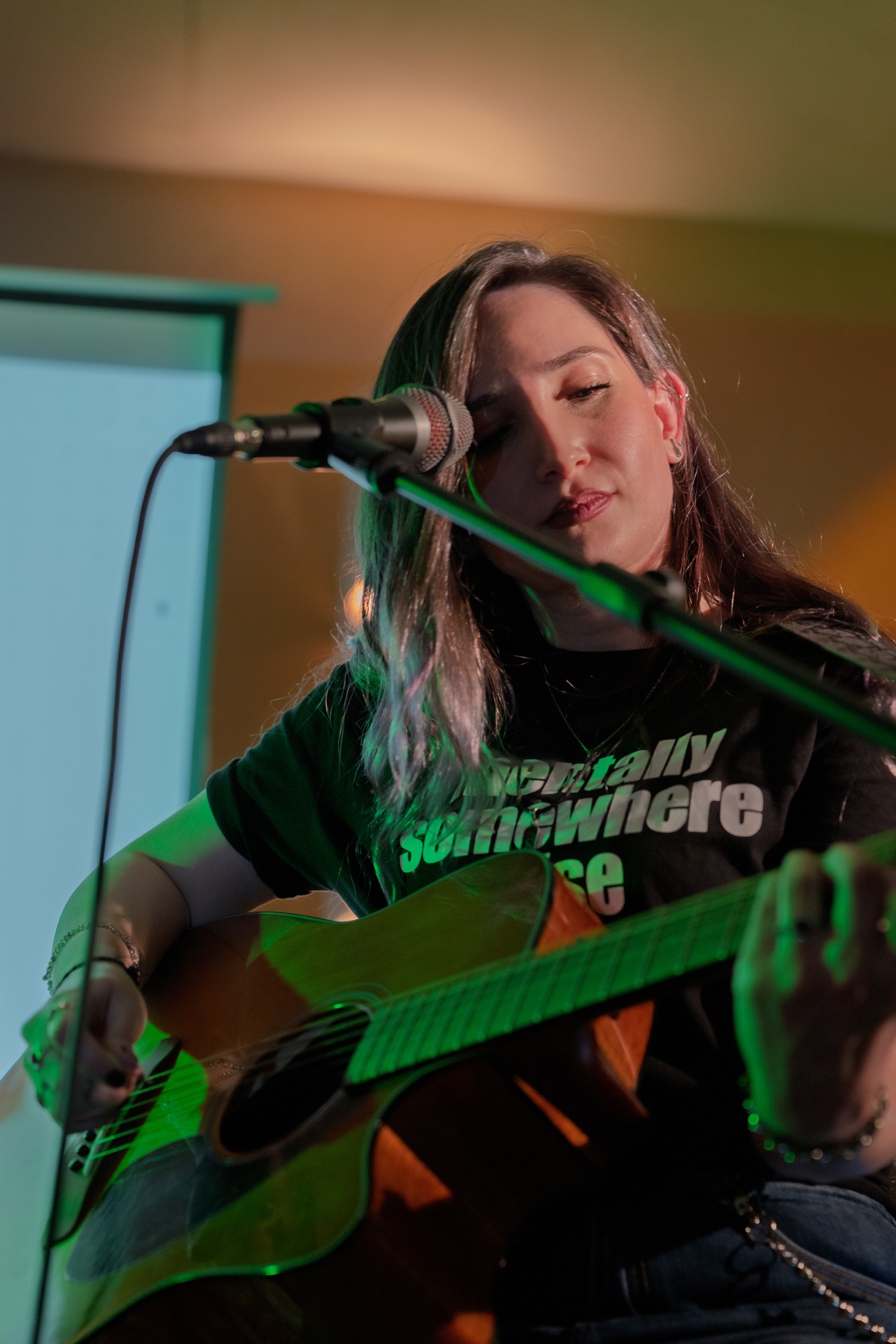 A guitarist performing live