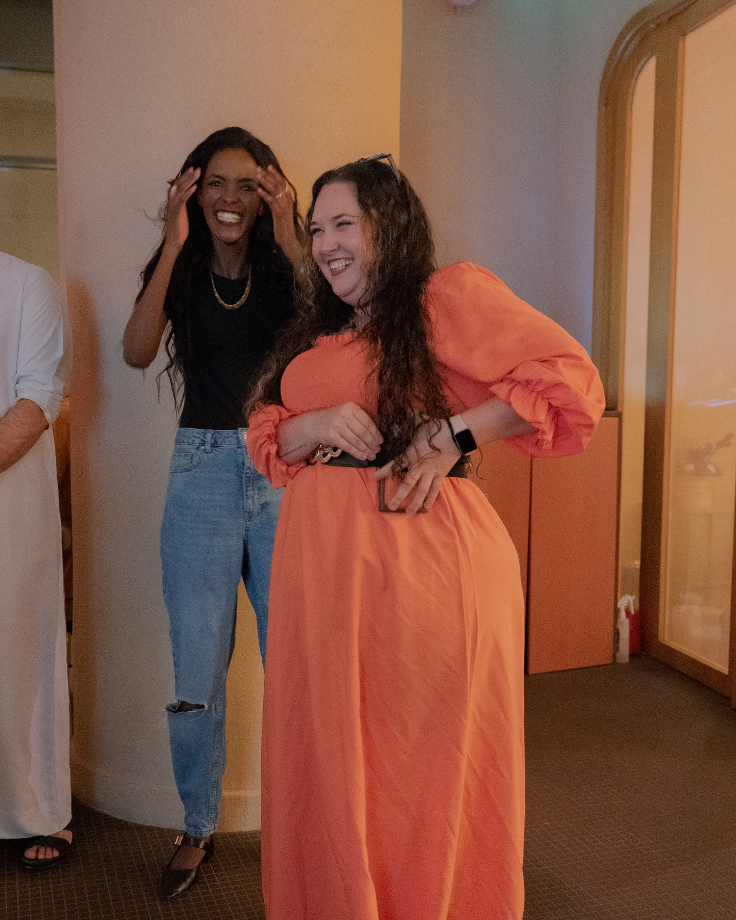 Sahar Ali laughing with a collaborator